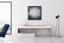 Load image into Gallery viewer, It is an original abstract painting with a central mauve orb expressing radiating light through the dark background. The Painting is hung on  wall  in a spacious upscale condo with condo with modern furniture. 

